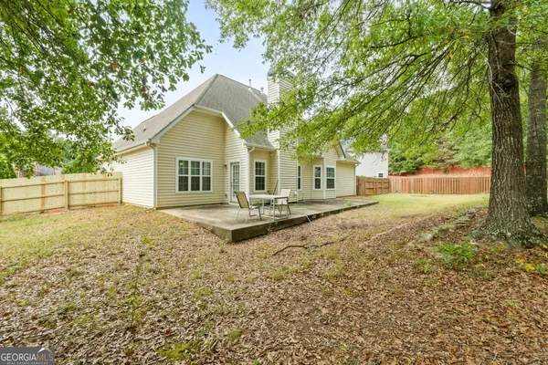 a house view with a garden space