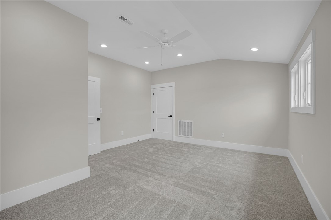1230 Melton Road, Unit 216 West Union, SC 29696 - Photo 32 of 49 A quiet retreat with recessed lighting, an inviting sloped ceiling, and comfortable carpeting for relaxed living.