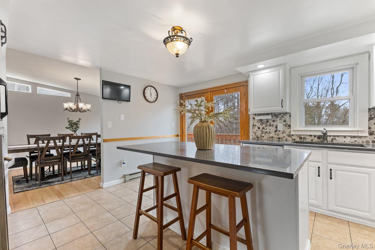 4 Stonewall Farm Road Mahopac, NY 10541 - Photo 15 of 37 Main kitchen with seating at center island.