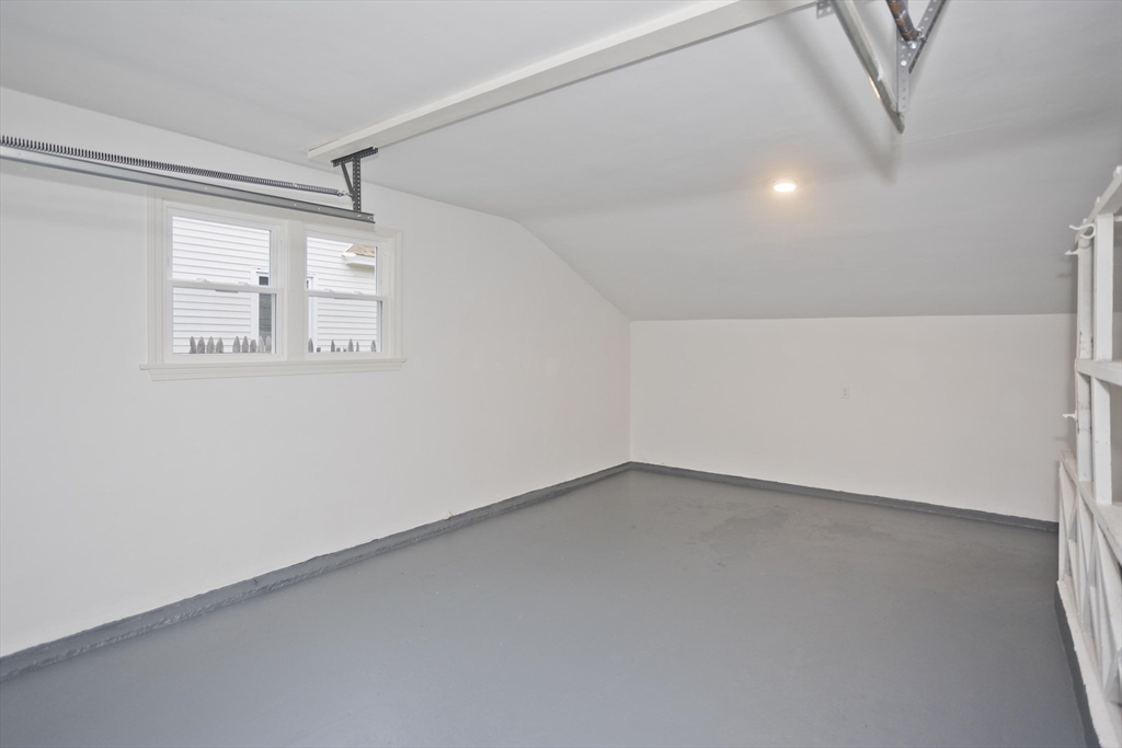 77 Drexel Street Springfield, MA 01104 - Photo 34 of 40 an empty room with a empty space and windows