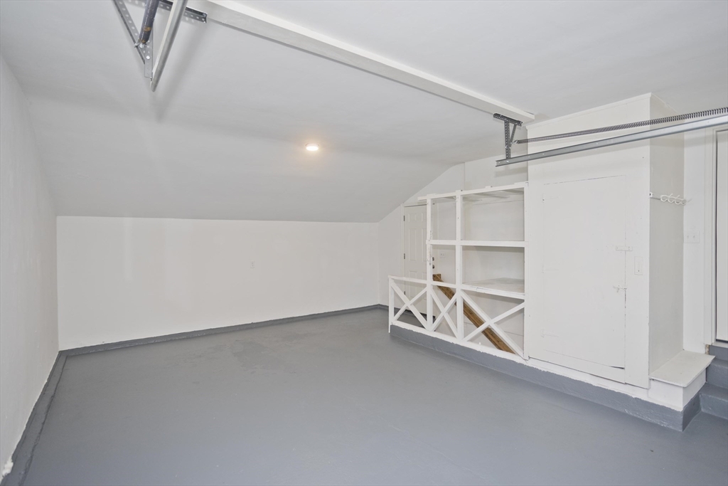 77 Drexel Street Springfield, MA 01104 - Photo 35 of 40 an empty room with windows