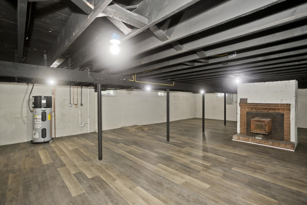 77 Drexel Street Springfield, MA 01104 - Photo 37 of 40 a view of an empty room with wooden floor