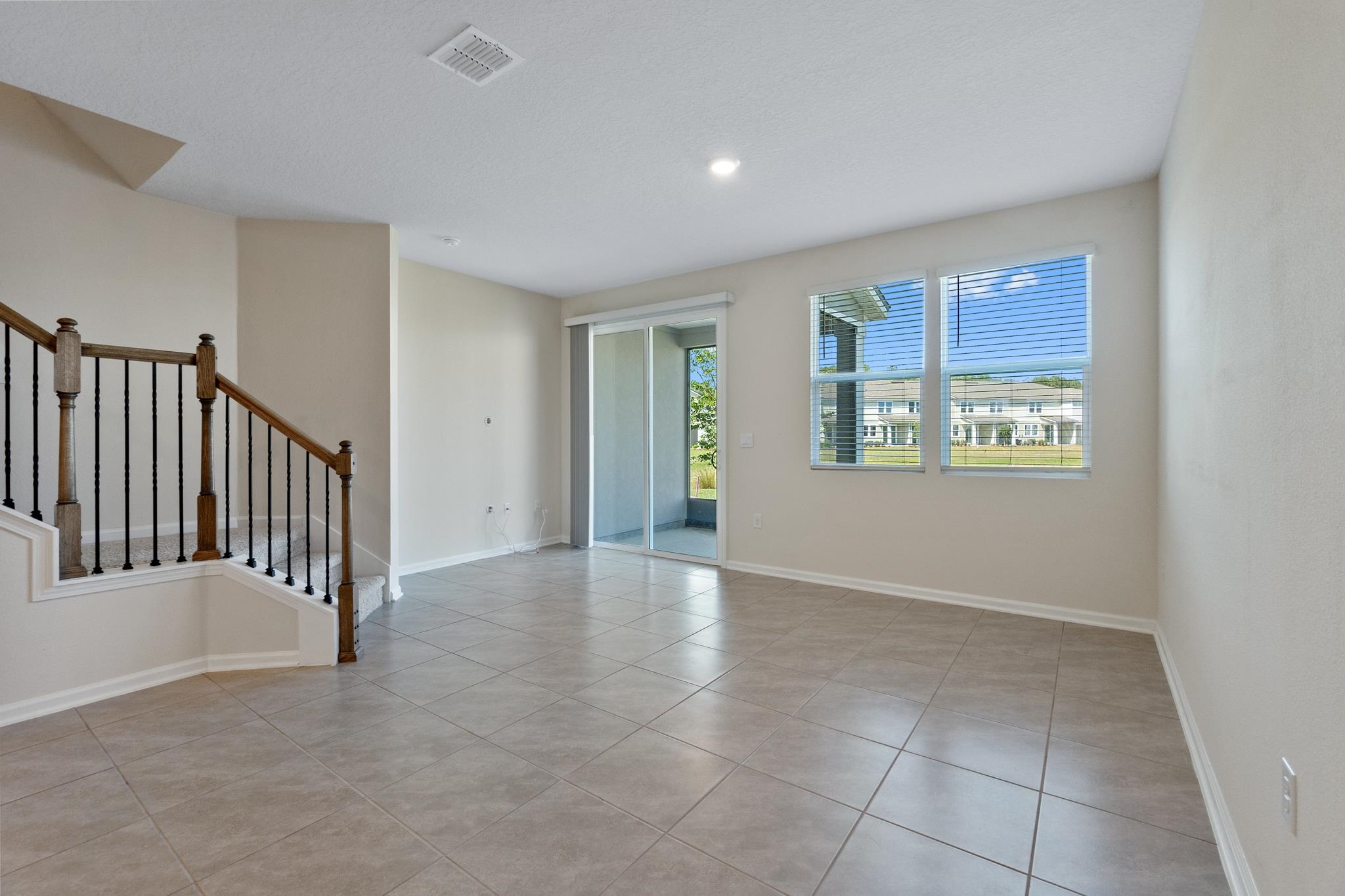 196 Redbud Road Palm Coast, FL 32137 - Photo 14 of 41 a view of an empty room with a window