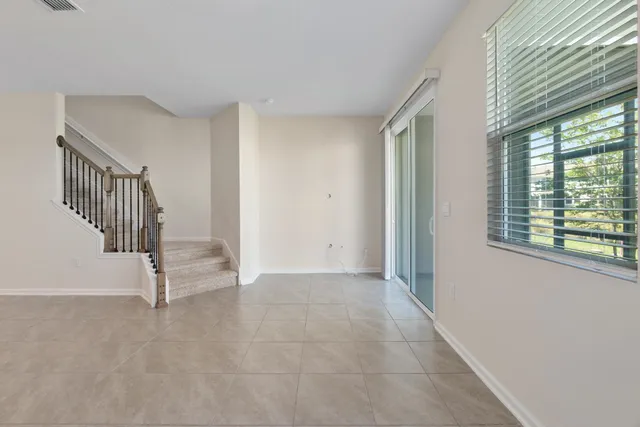 a view of a livingroom with a staircase