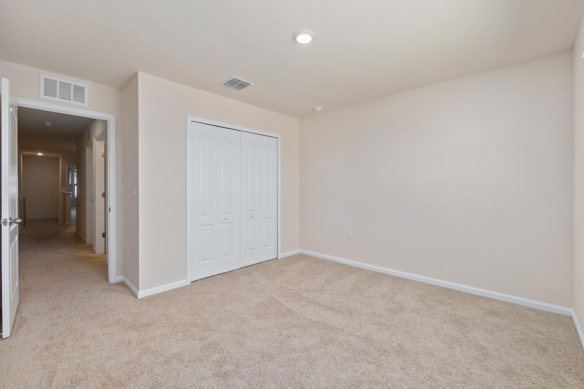 196 Redbud Road Palm Coast, FL 32137 - Photo 31 of 41 an empty room with an entryway