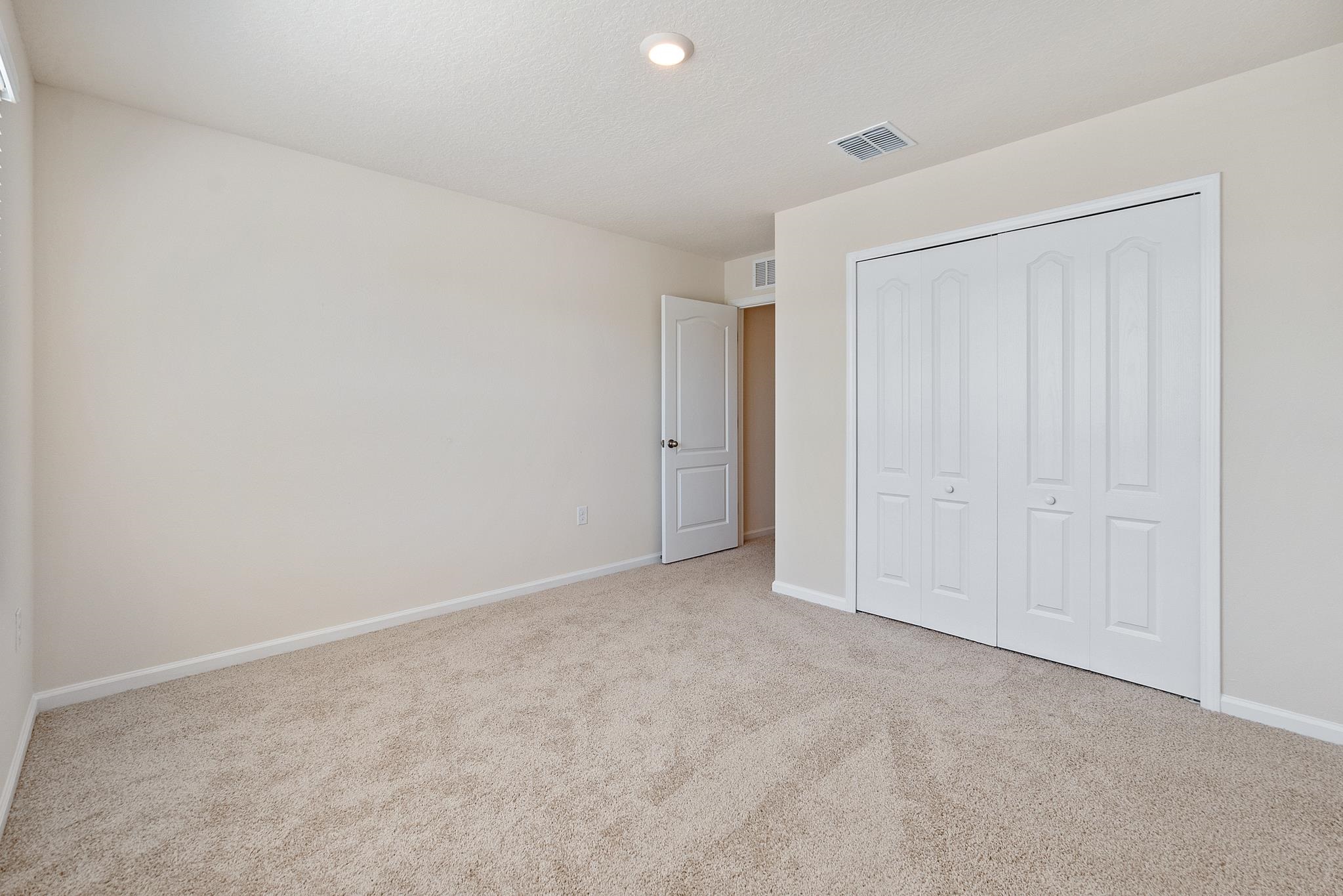 196 Redbud Road Palm Coast, FL 32137 - Photo 32 of 41 a view of an empty room