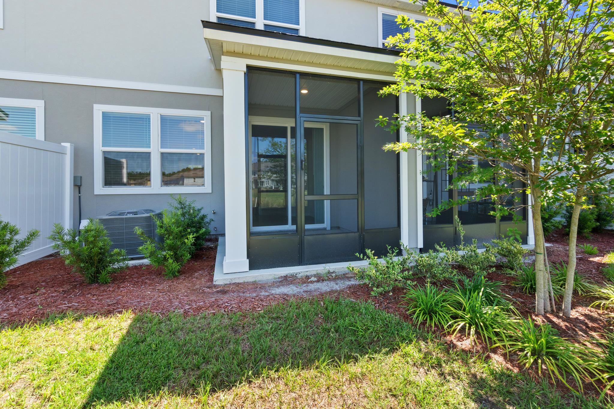 196 Redbud Road Palm Coast, FL 32137 - Photo 35 of 41 front view of a house with a yard