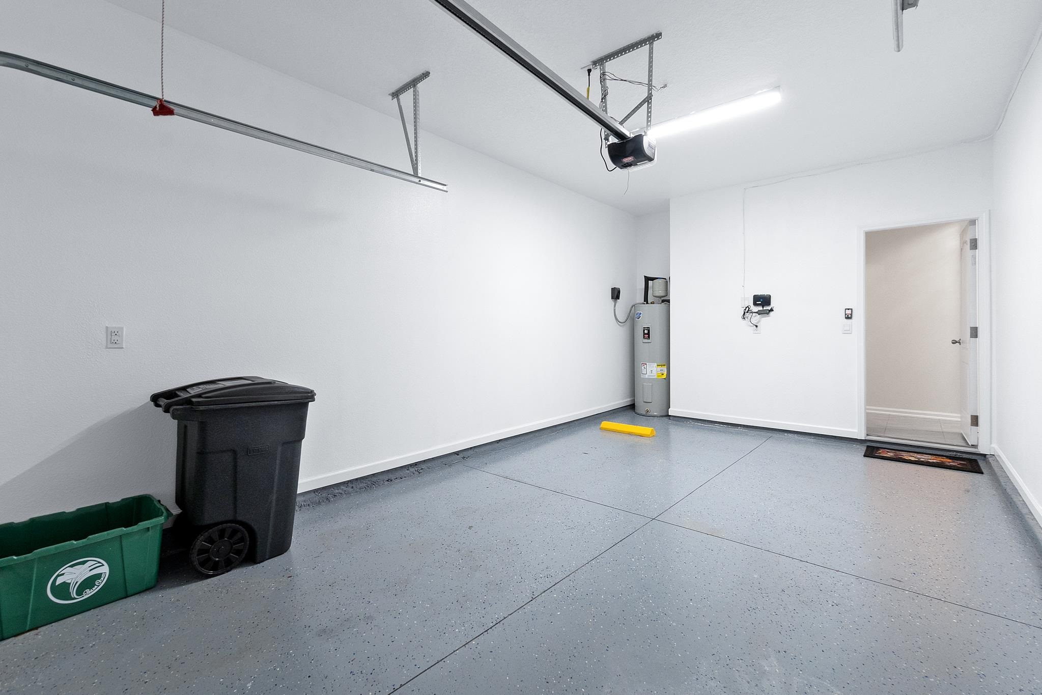 196 Redbud Road Palm Coast, FL 32137 - Photo 37 of 41 a view of a storage & utility room with a window