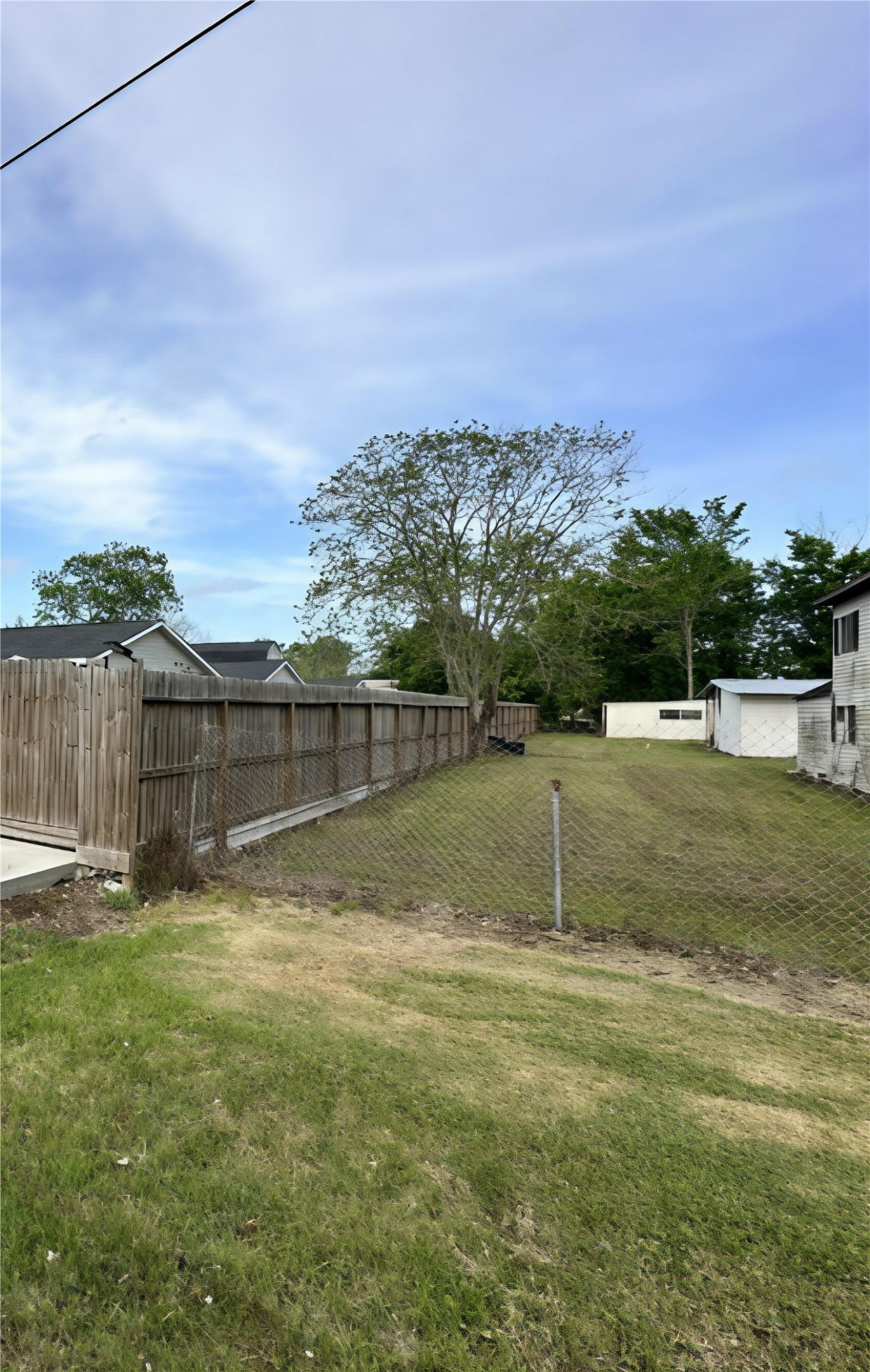 207 South 5th Street Highlands, TX 77562 - Photo 15 of 15 a view of a backyard
