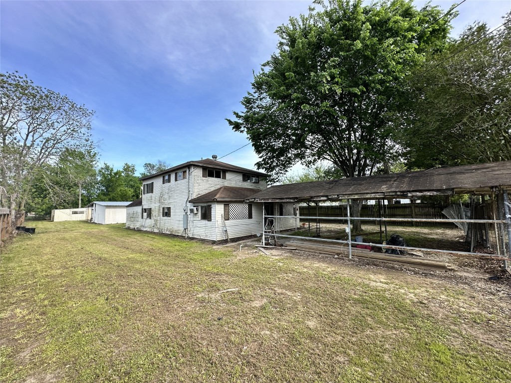 207 South 5th Street Highlands, TX 77562 - Photo 4 of 15 a view of a house with a yard and sitting area