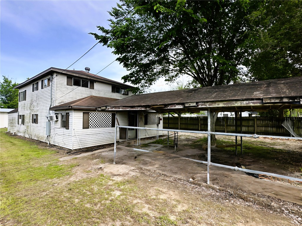 207 South 5th Street Highlands, TX 77562 - Photo 6 of 15 a front view of a house with a yard