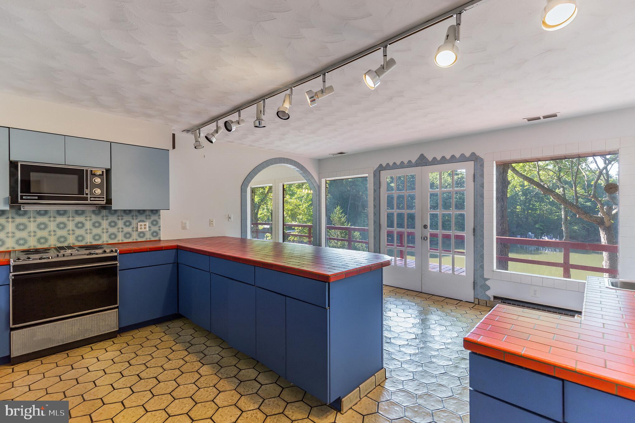 13290 Olivet Road Lusby, MD 20657 - Photo 5 of 35 Kitchen design captures views and comforts