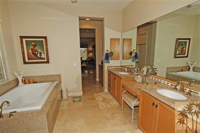 54 Vía Bella Rancho Mirage, CA 92270 - Photo 18 of 25 a spacious bathroom with a tub sink and mirror