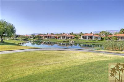 54 Vía Bella Rancho Mirage, CA 92270 - Photo 23 of 25 a view of a lake with a city