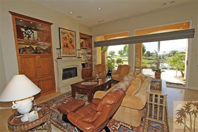54 Vía Bella Rancho Mirage, CA 92270 - Photo 6 of 25 a living room with furniture and a fireplace