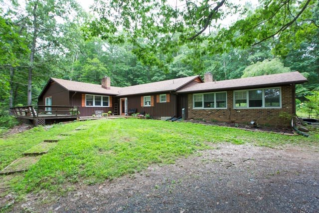 869 Union Church Road Churchville, VA 24421 - Photo 1 of 31 a front view of a house with yard porch and green space