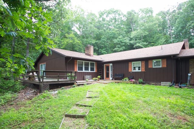 869 Union Church Road Churchville, VA 24421 - Photo 26 of 31 a front view of a house with a yard and trees