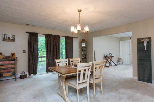 869 Union Church Road Churchville, VA 24421 - Photo 4 of 31 a view of a dining room with furniture window and outside view