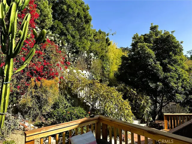 a view of a tree in a balcony