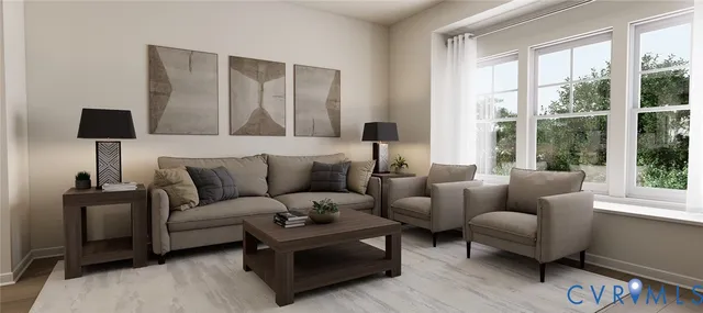 a living room with furniture and a lamp