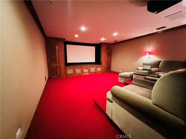 a view of a living room with a baby crib