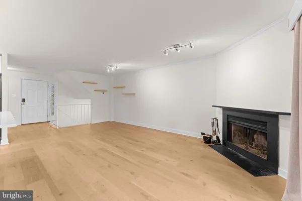 a view of a hallway with closet area