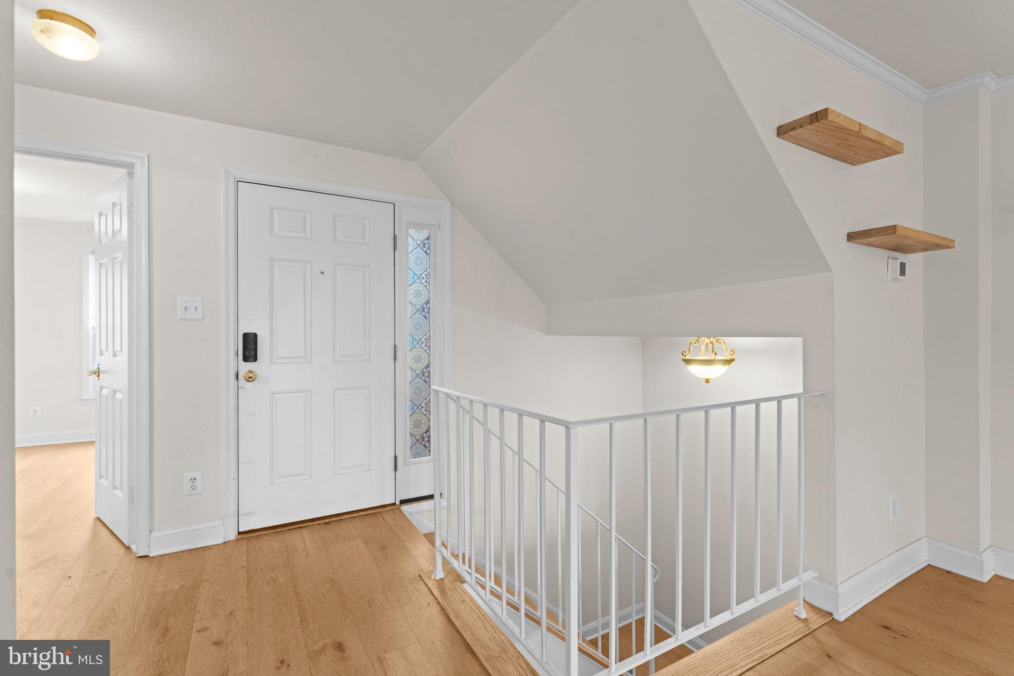 2105 North Rolfe Street, Unit A Arlington, VA 22209 - Photo 14 of 56 a view of a hallway with closet area