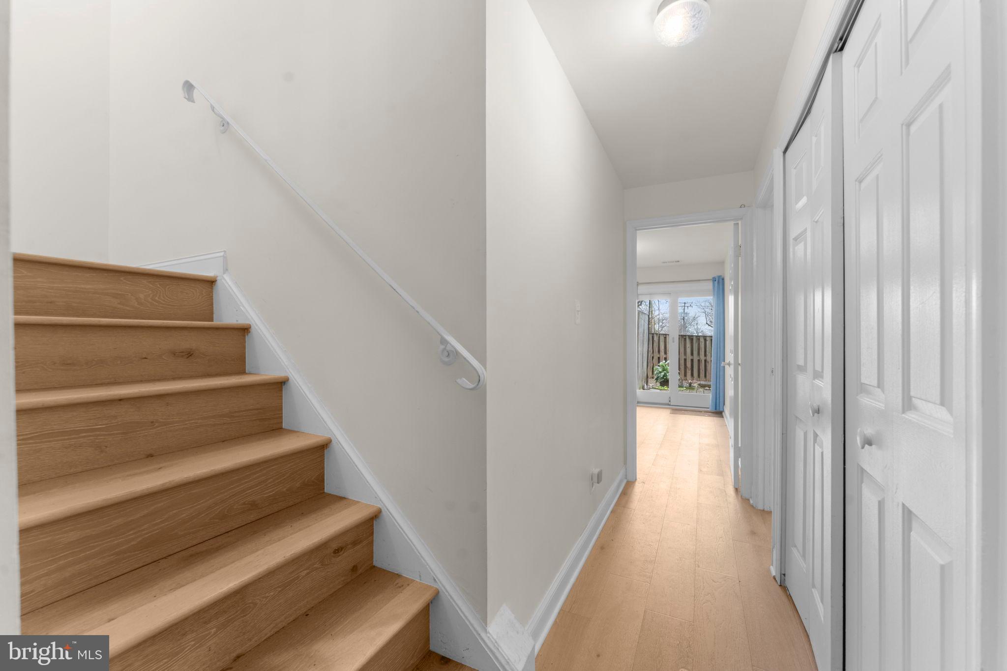 2105 North Rolfe Street, Unit A Arlington, VA 22209 - Photo 22 of 56 a view of entryway and hall with wooden floor