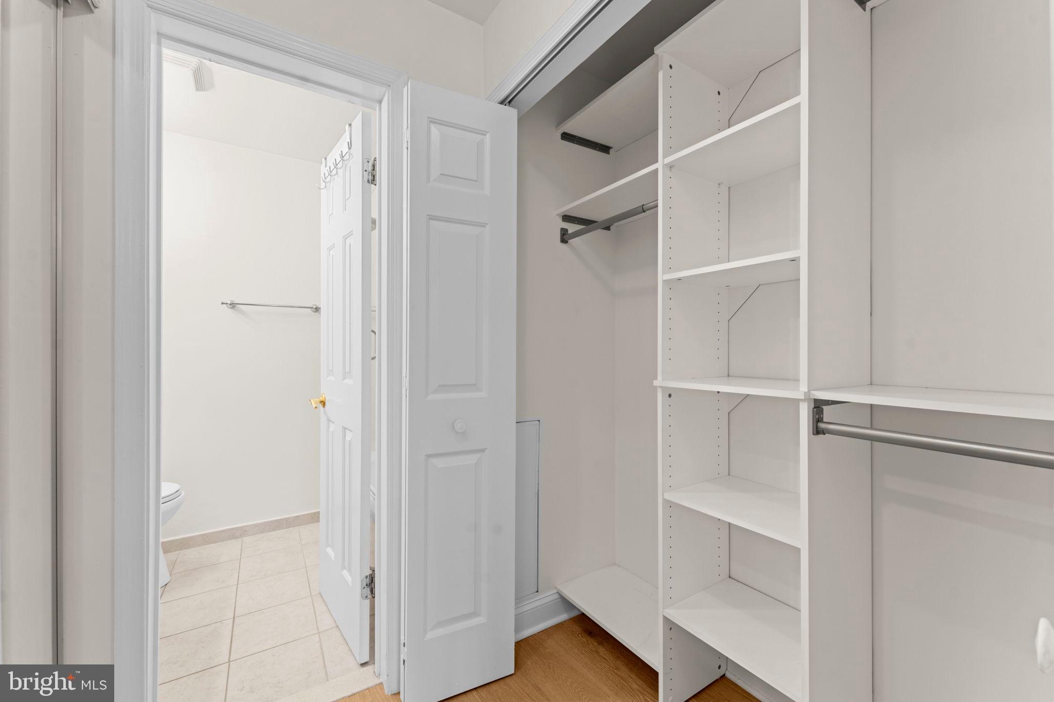 2105 North Rolfe Street, Unit A Arlington, VA 22209 - Photo 29 of 56 a view of walk in closet with empty racks