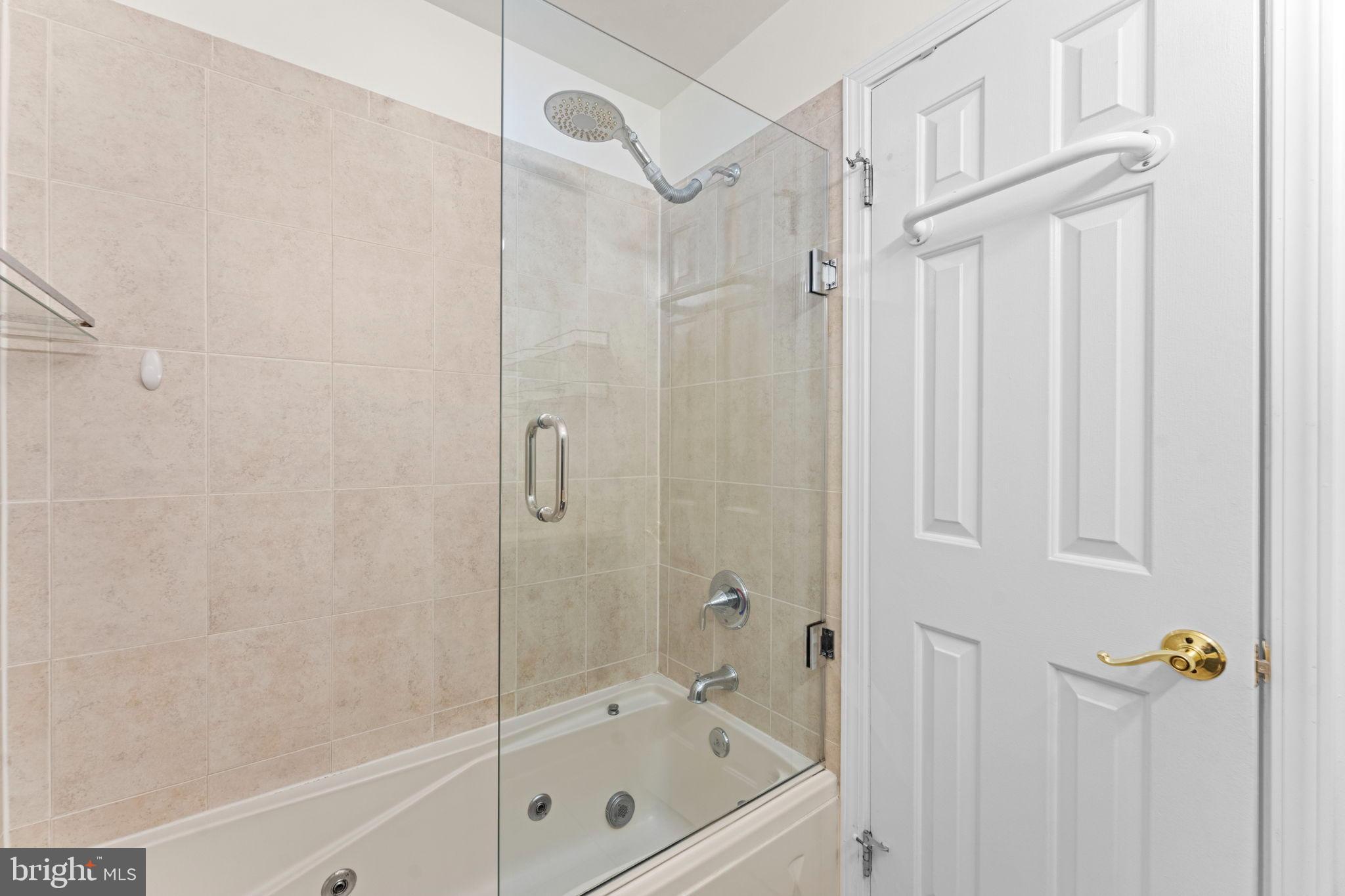 2105 North Rolfe Street, Unit A Arlington, VA 22209 - Photo 31 of 56 a bathroom with a shower