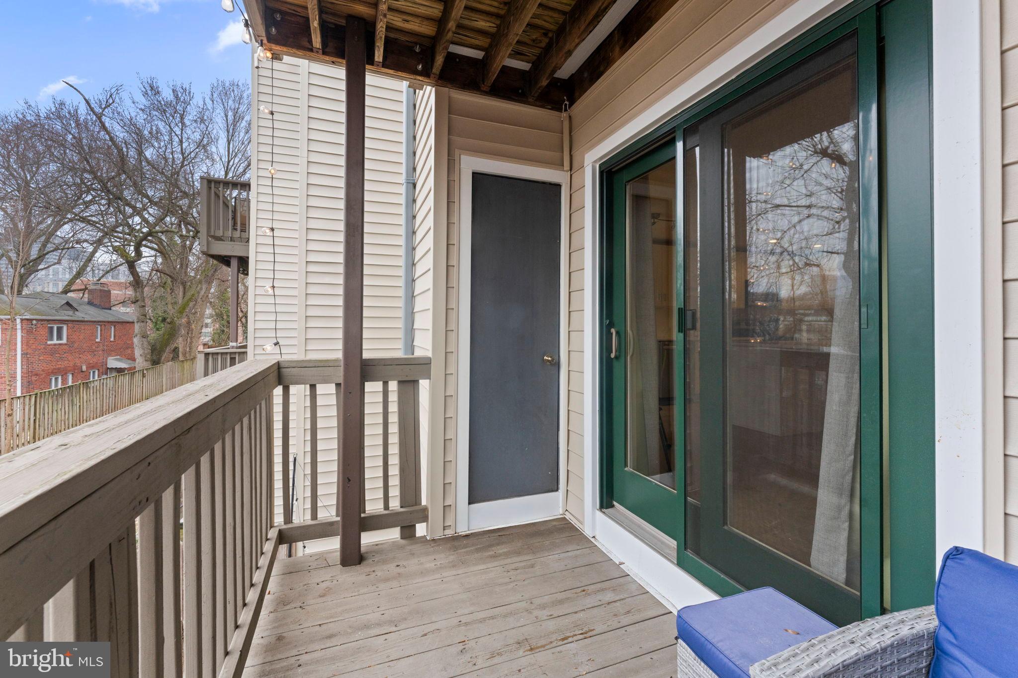 2105 North Rolfe Street, Unit A Arlington, VA 22209 - Photo 36 of 56 a view of a balcony with wooden floor