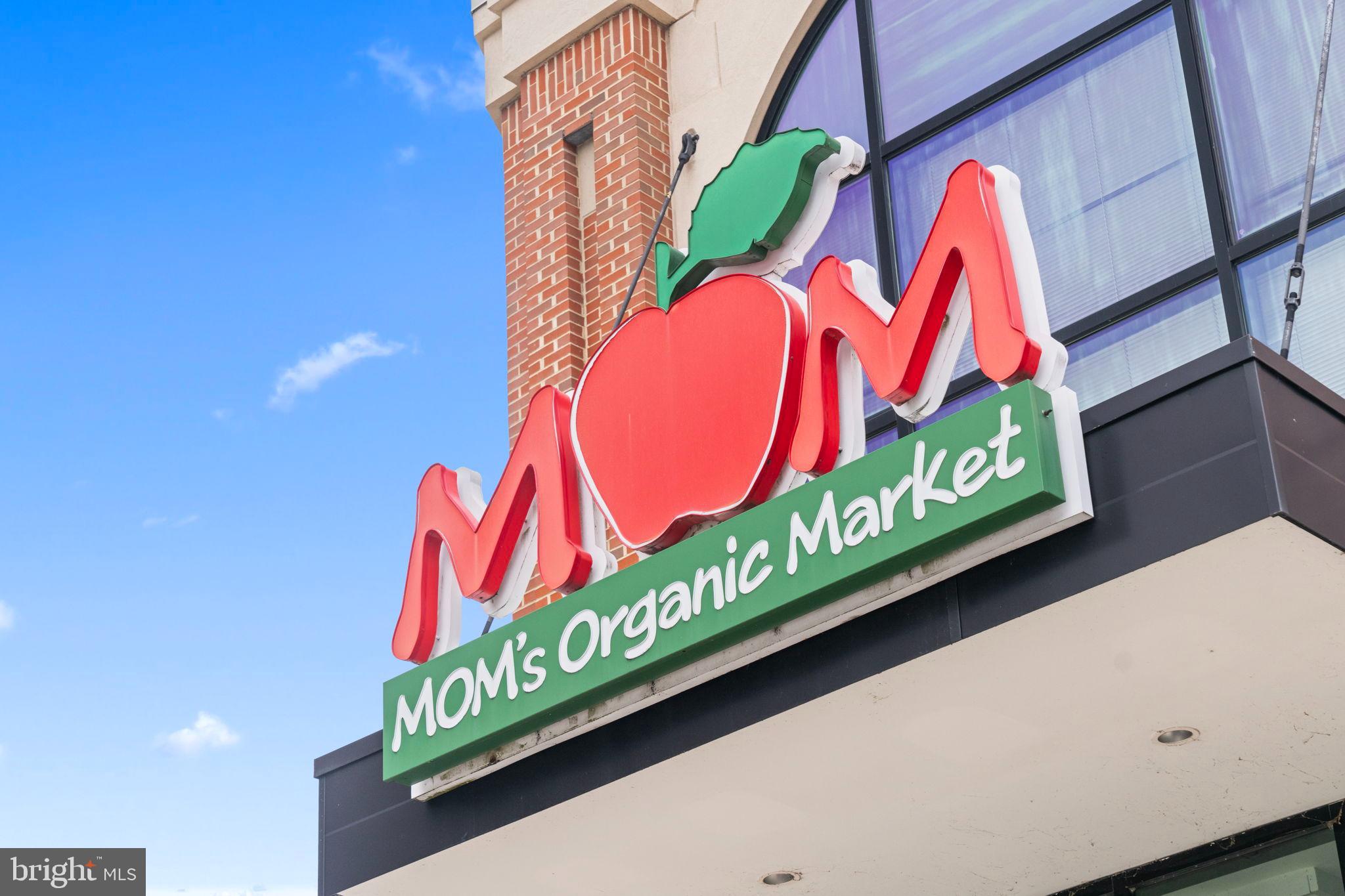 2105 North Rolfe Street, Unit A Arlington, VA 22209 - Photo 43 of 56 a street sign that is on a wall