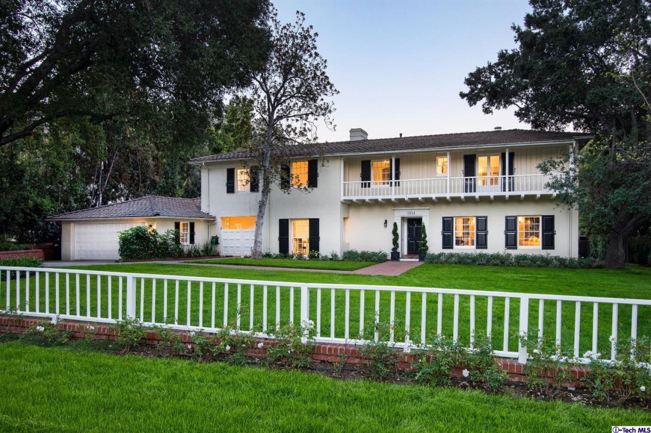 1814 Midlothian Drive Altadena, CA 91001 - Photo 2 of 42 a front view of a house with a yard table and chairs