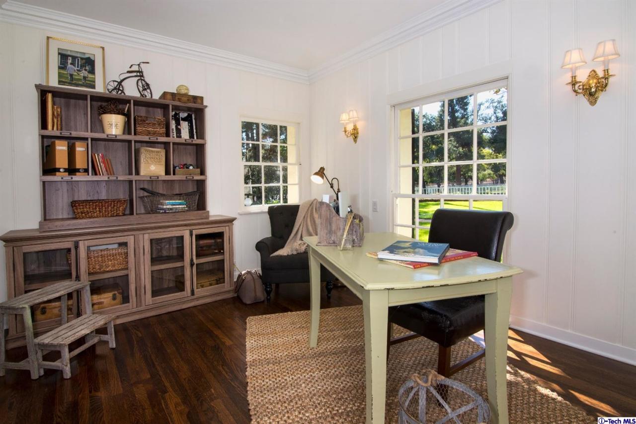 1814 Midlothian Drive Altadena, CA 91001 - Photo 17 of 42 a view of a workspace with furniture bookshelf and a window