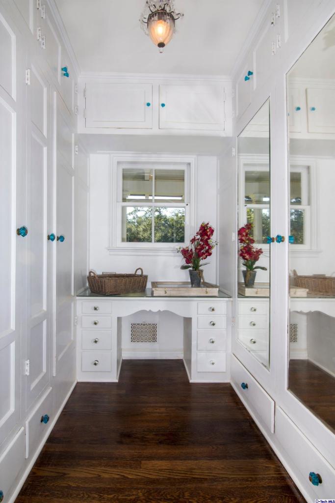 1814 Midlothian Drive Altadena, CA 91001 - Photo 22 of 42 a kitchen with granite countertop white cabinets and white appliances
