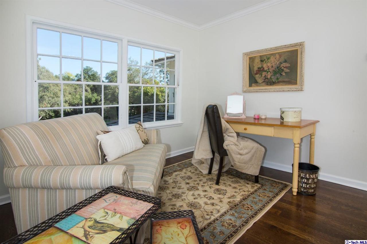 1814 Midlothian Drive Altadena, CA 91001 - Photo 28 of 42 a living room with furniture and a window