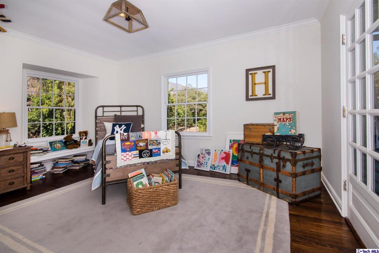 1814 Midlothian Drive Altadena, CA 91001 - Photo 29 of 42 a bedroom with furniture and a window