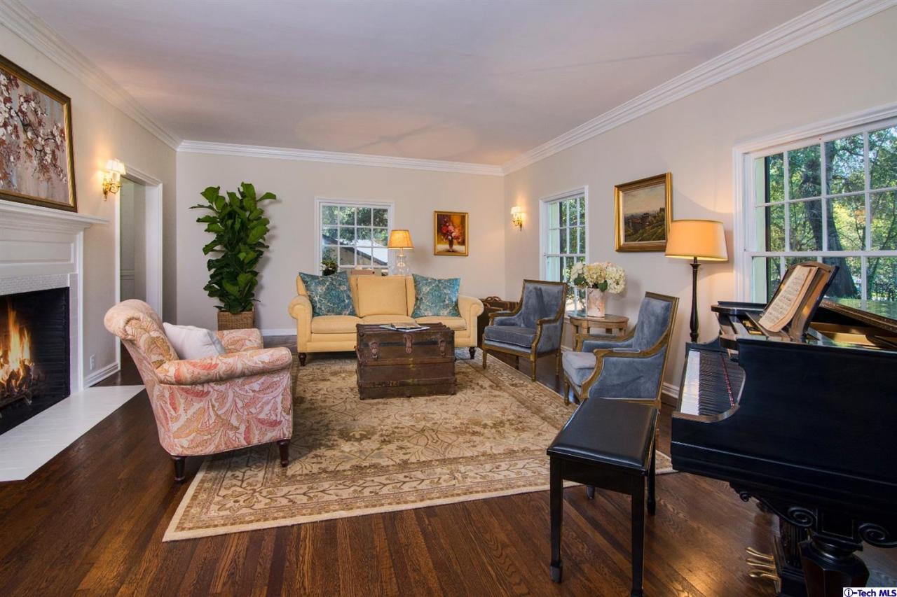 1814 Midlothian Drive Altadena, CA 91001 - Photo 6 of 42 a living room with furniture and a fireplace