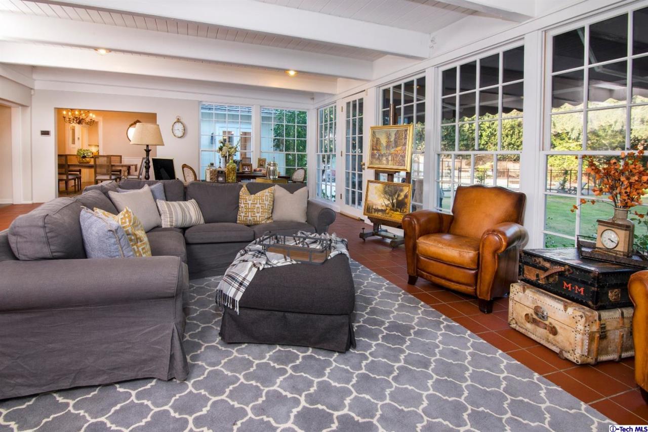 1814 Midlothian Drive Altadena, CA 91001 - Photo 9 of 42 a living room with furniture and a window