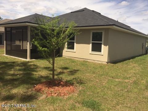 401 Deer Crossing Road St. Augustine, FL 32086 - Photo 6 of 20 a backyard of a house