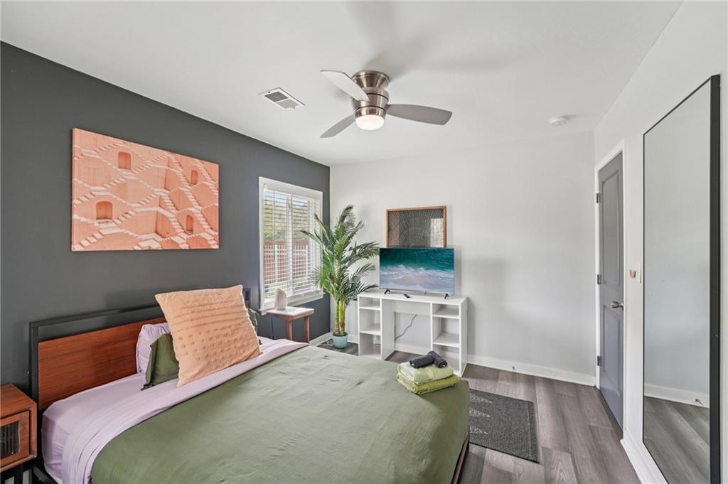 2659 Glenvalley Drive Decatur, GA 30032 - Photo 22 of 59 a bedroom with a bed furniture and a window