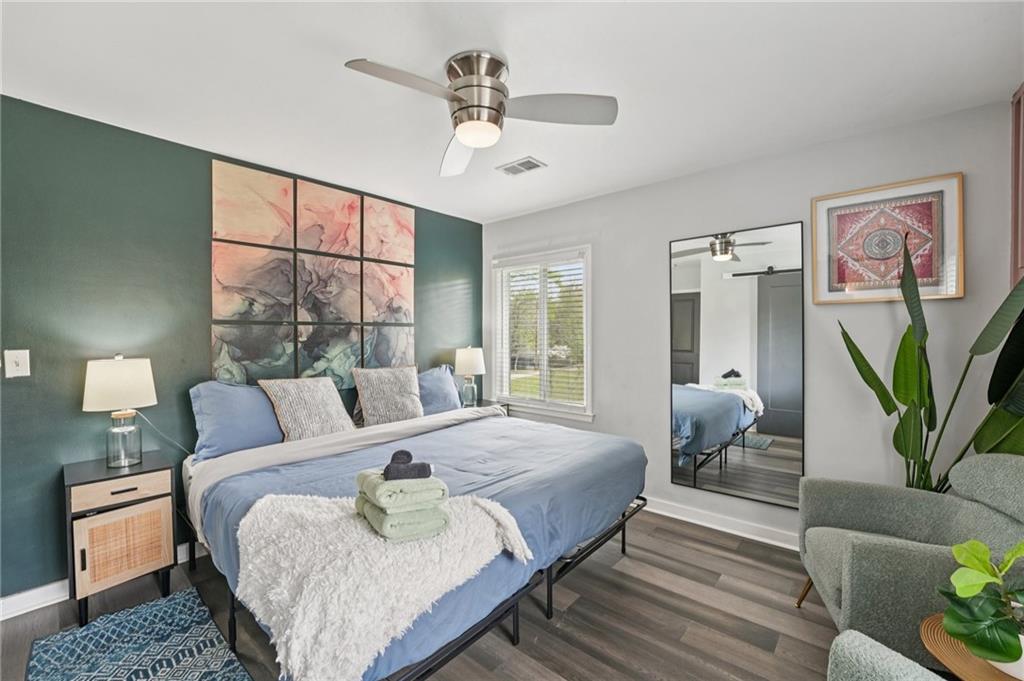 2659 Glenvalley Drive Decatur, GA 30032 - Photo 26 of 59 a bedroom with a bed couch and window