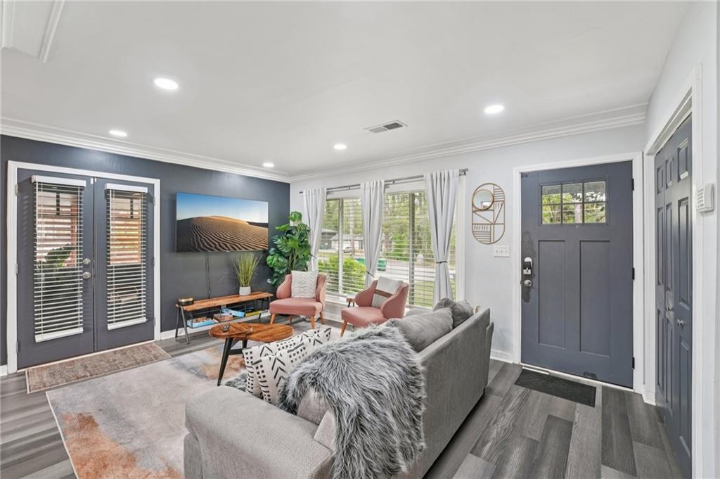 2659 Glenvalley Drive Decatur, GA 30032 - Photo 3 of 59 a living room with furniture and a flat screen tv