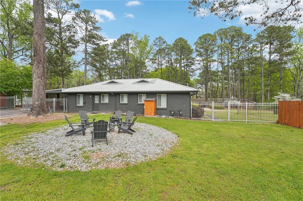 2659 Glenvalley Drive Decatur, GA 30032 - Photo 33 of 59 a front view of a house with a garden