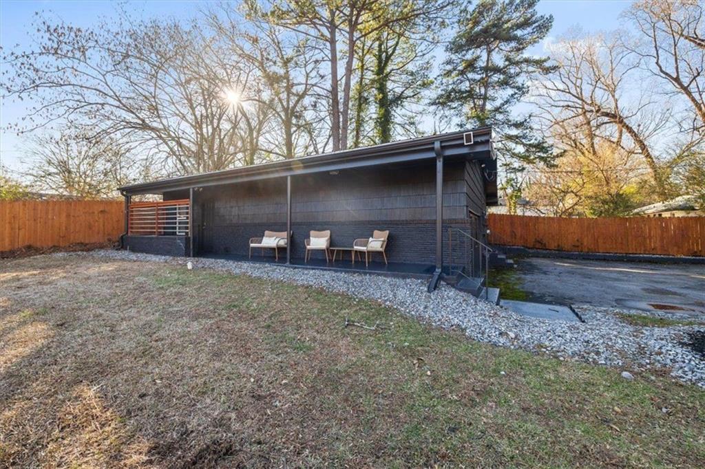 2659 Glenvalley Drive Decatur, GA 30032 - Photo 35 of 59 a view of a house with a yard and garage