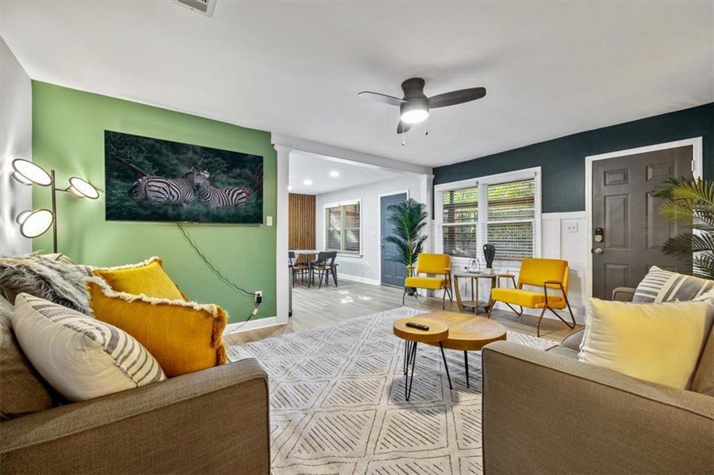 2659 Glenvalley Drive Decatur, GA 30032 - Photo 36 of 59 a living room with furniture and a flat screen tv