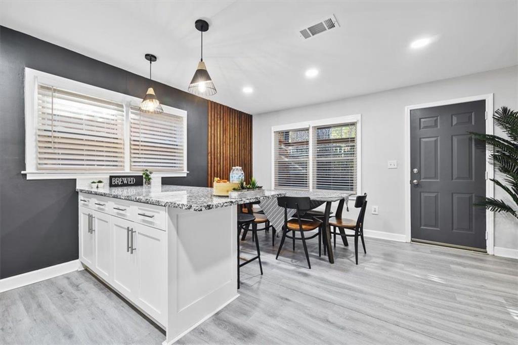 2659 Glenvalley Drive Decatur, GA 30032 - Photo 42 of 59 a view of a dining room with furniture window and wooden floor