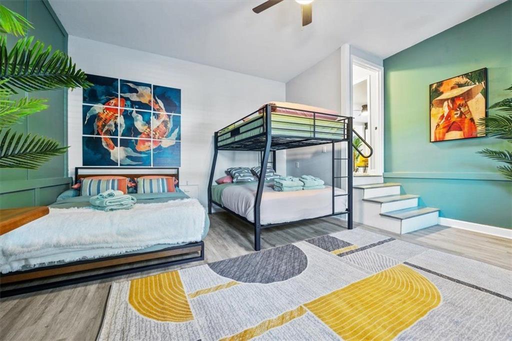 2659 Glenvalley Drive Decatur, GA 30032 - Photo 51 of 59 a bedroom with a bed and a painting on the wall