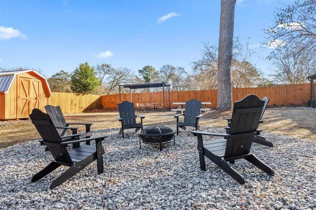 2659 Glenvalley Drive Decatur, GA 30032 - Photo 57 of 59 a swimming pool with outdoor seating and yard