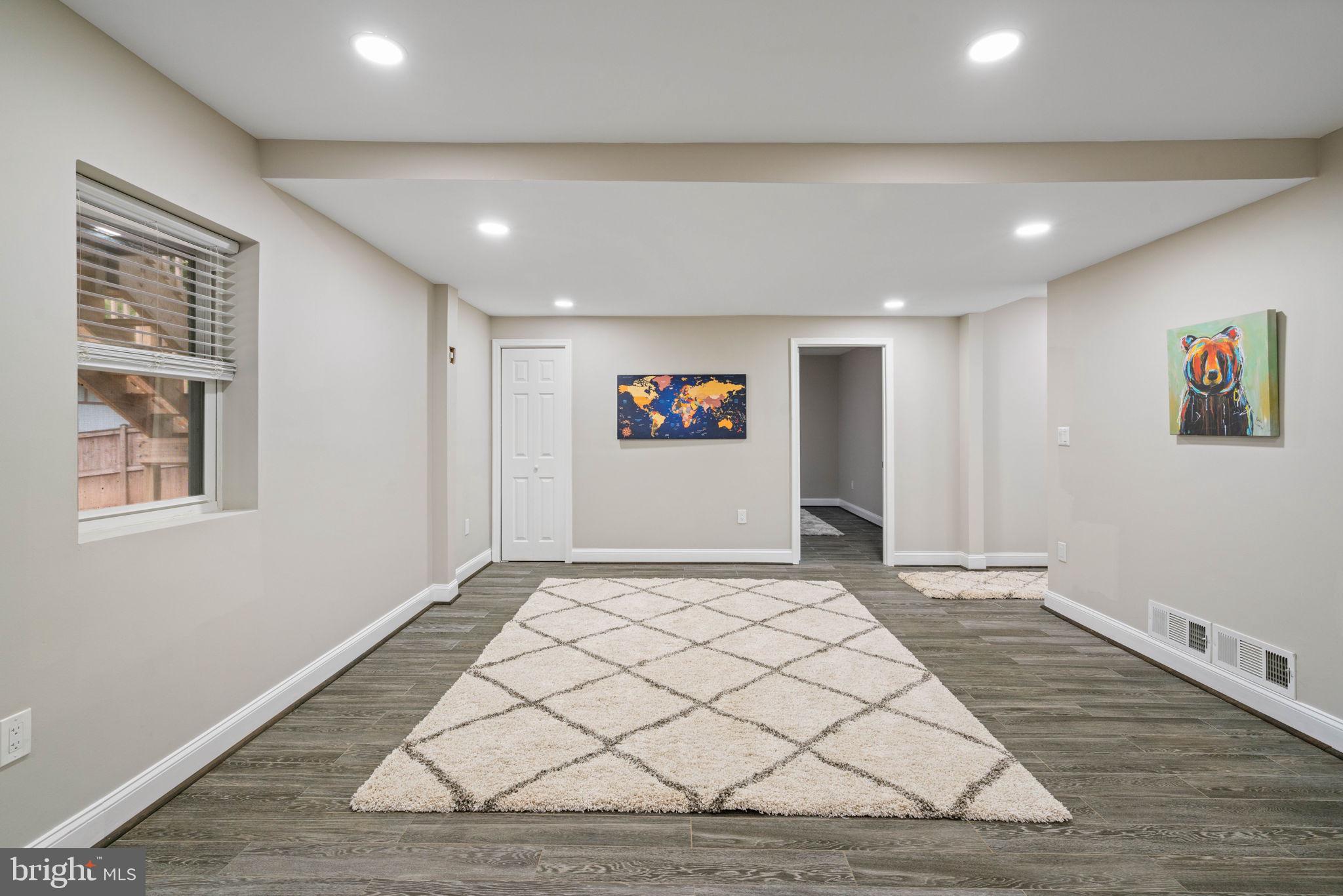 6555 Davis Ford Road Manassas, VA 20111 - Photo 46 of 59 Wood Plank Tile Floors Throughout